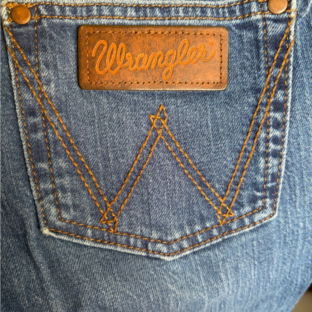 Wrangler Blue Denim Jeans with Brown Leather Patch